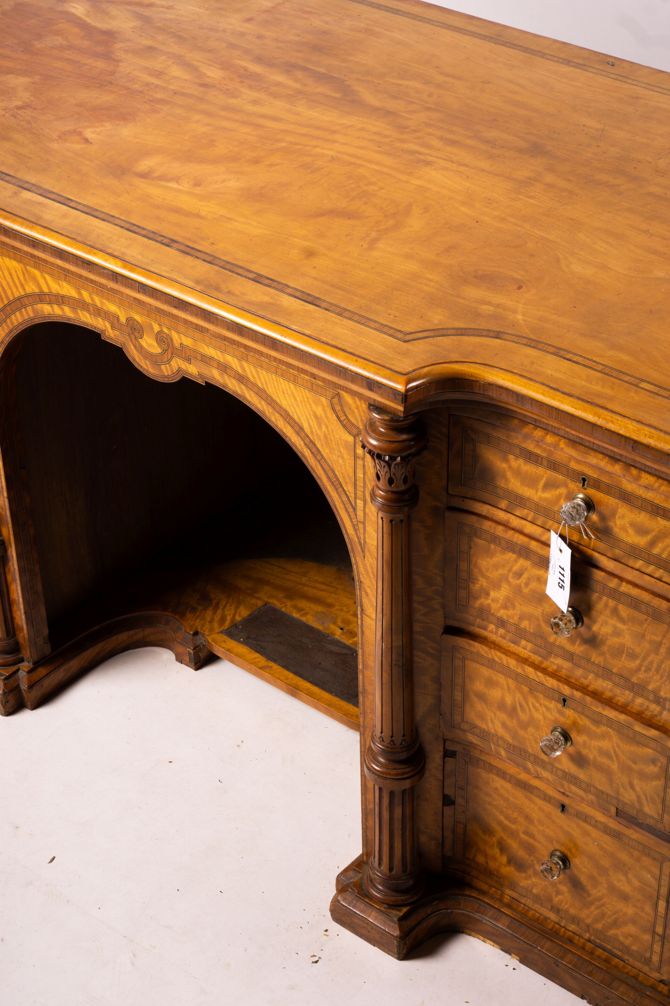 A late Victorian banded satinwood kneehole desk, width 138cm, depth 67cm, height 71cm